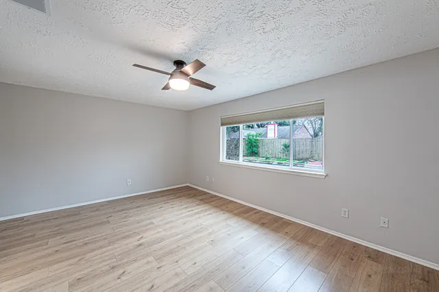 a view of a livingroom with a kitchen