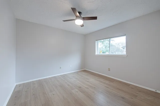 a spacious bathroom with a double vanity sink mirror and double