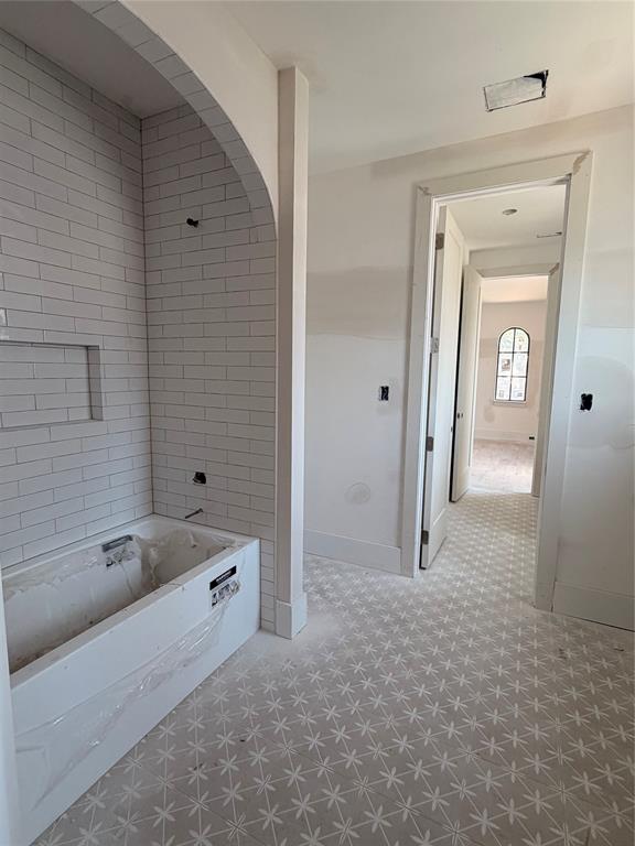 3830 Dunhaven Road Dallas, TX 75220 - Photo 19 of 21 a bathroom with a tub shower and sink
