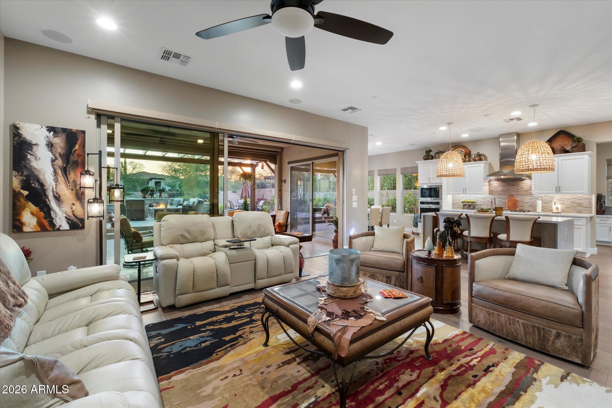 17561 Blaze Lane Rio Verde, AZ 85263 - Photo 10 of 46 a living room with furniture and a large window