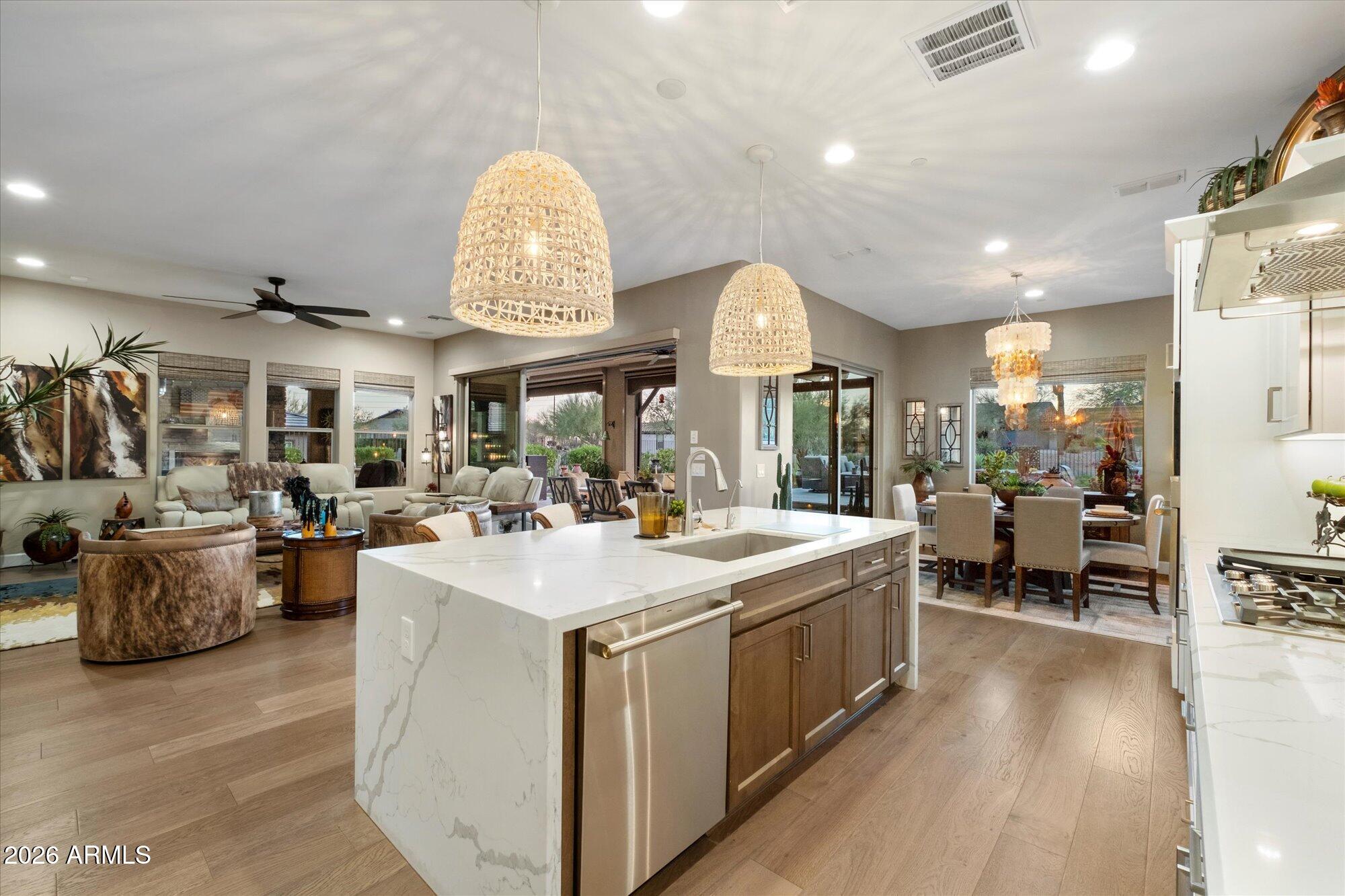 17561 Blaze Lane Rio Verde, AZ 85263 - Photo 17 of 46 a large kitchen with a large window and furniture