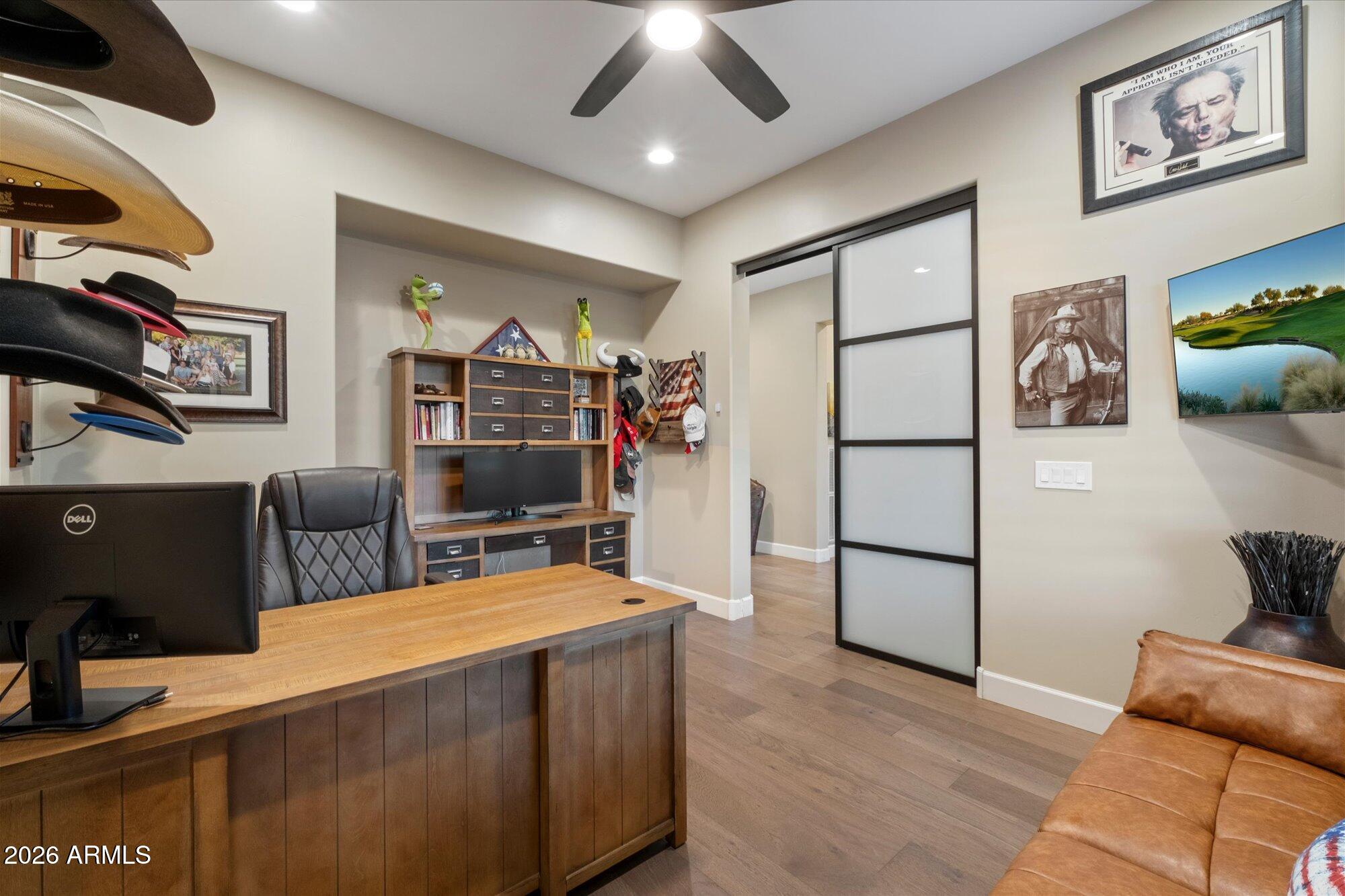 17561 Blaze Lane Rio Verde, AZ 85263 - Photo 19 of 46 a view of a livingroom with furniture and a flat screen tv