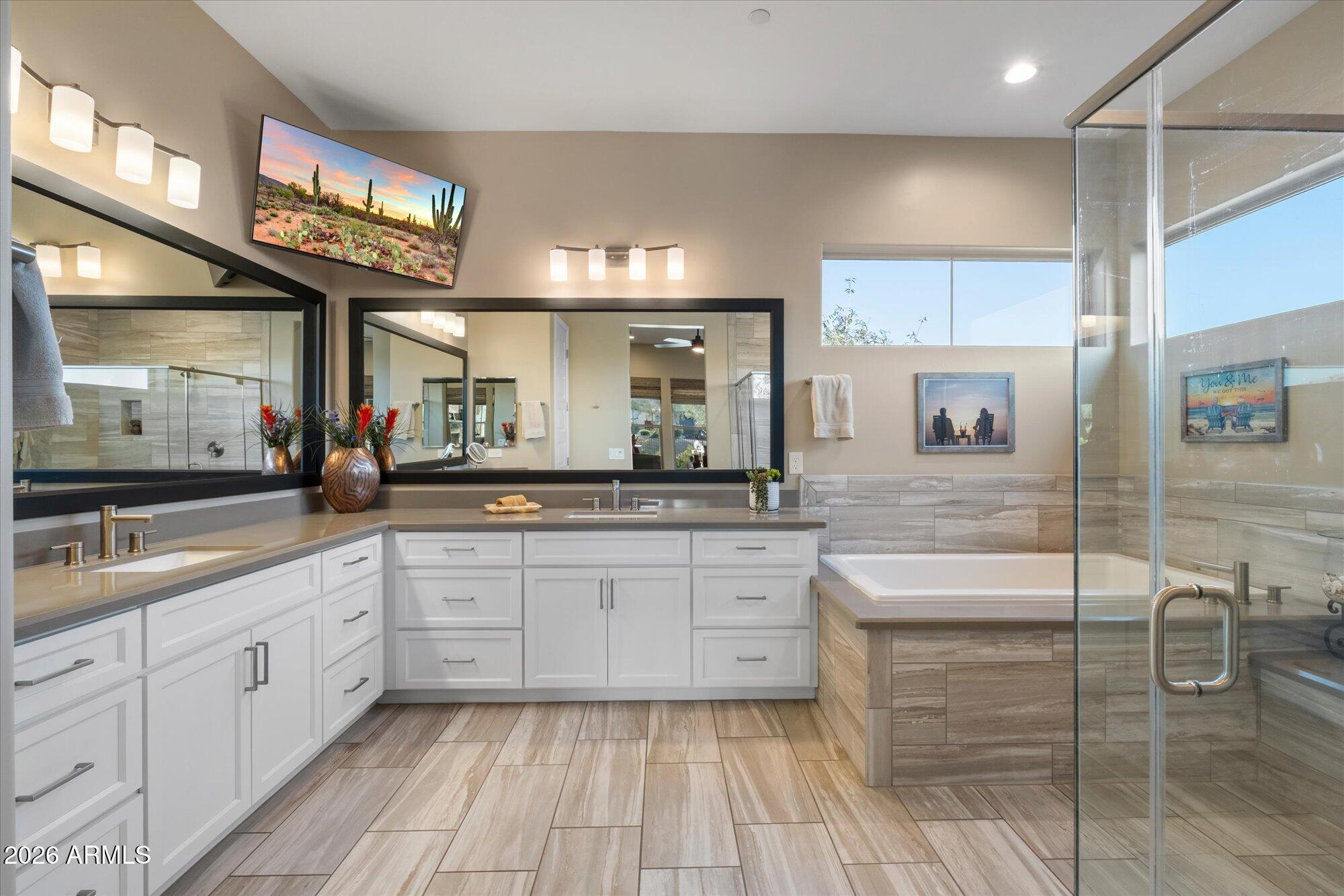 17561 Blaze Lane Rio Verde, AZ 85263 - Photo 22 of 46 a large bathroom with a large mirror and sink