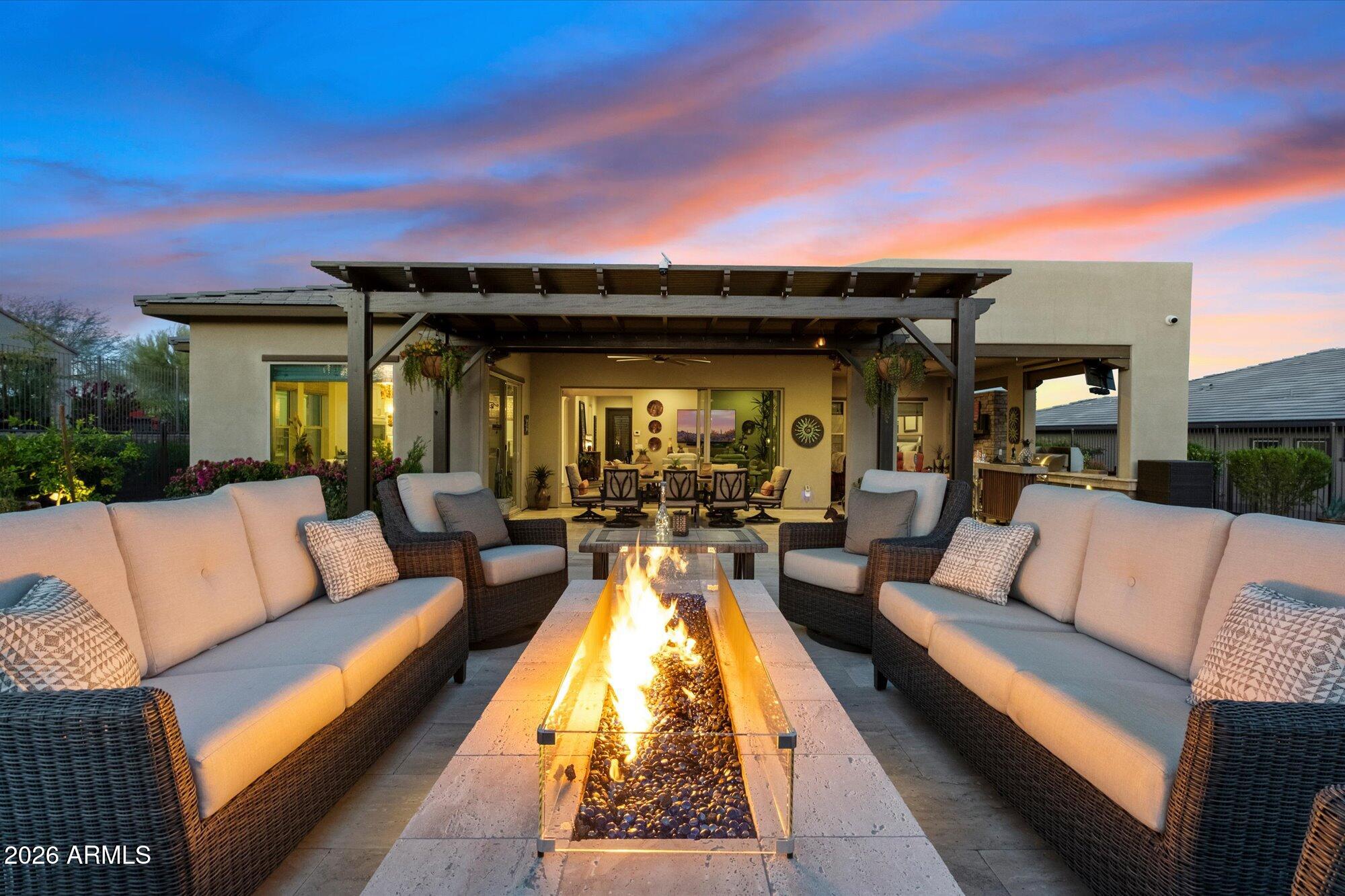 17561 Blaze Lane Rio Verde, AZ 85263 - Photo 2 of 46 a view of swimming pool with seating area and furniture