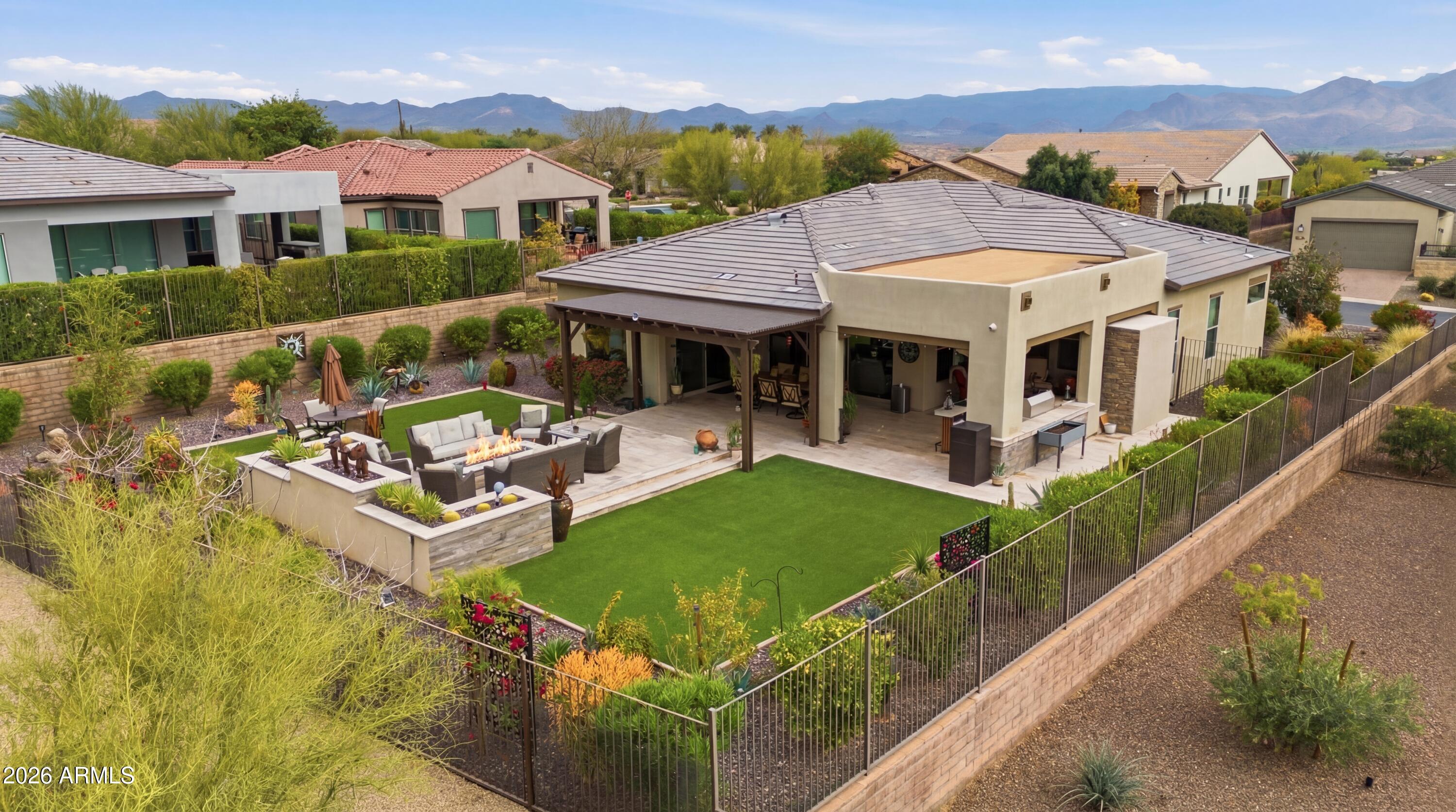17561 Blaze Lane Rio Verde, AZ 85263 - Photo 37 of 46 a view of a house with pool and chairs