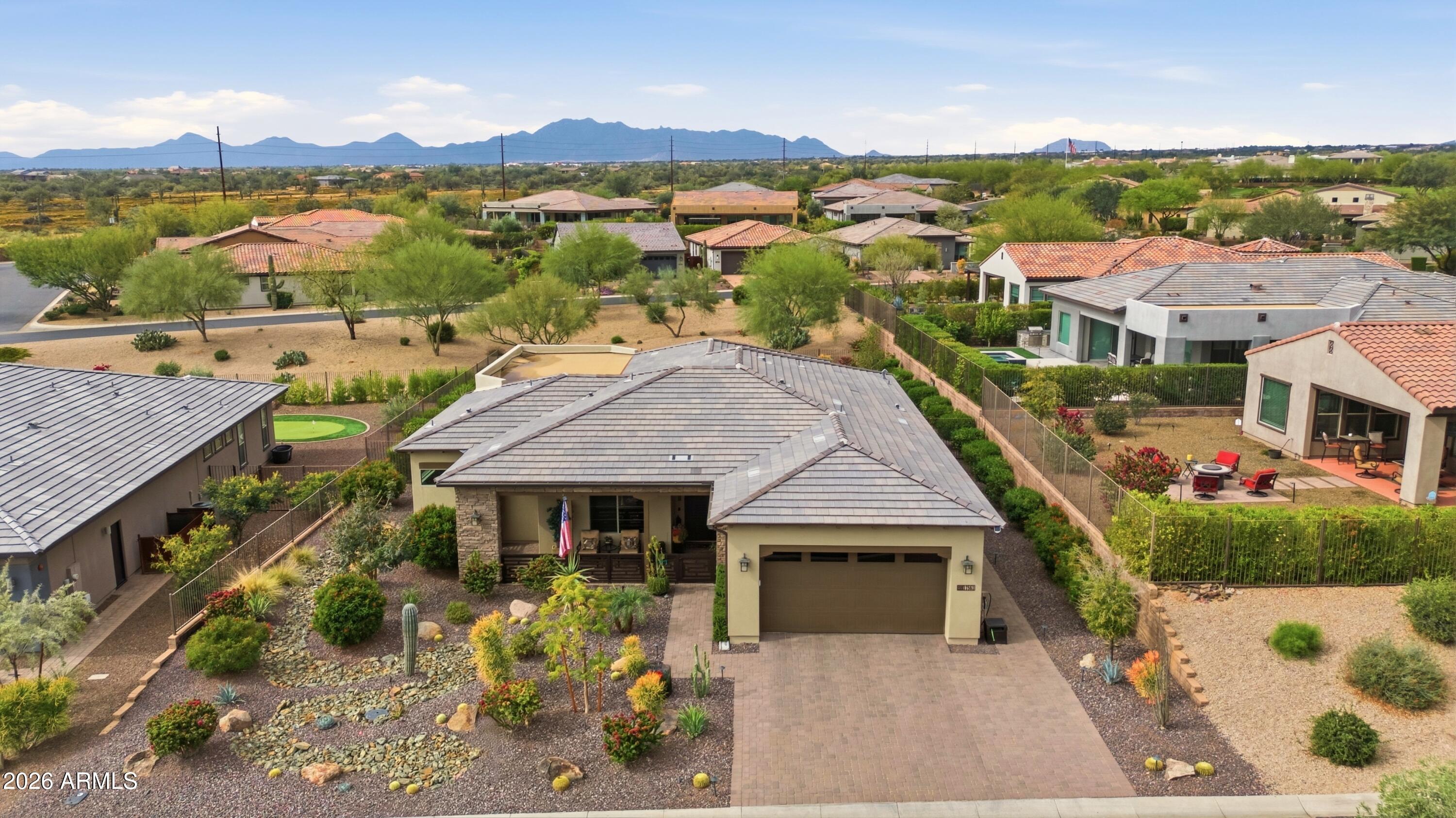 17561 Blaze Lane Rio Verde, AZ 85263 - Photo 39 of 46 an aerial view of a house with a yard garage and lake view
