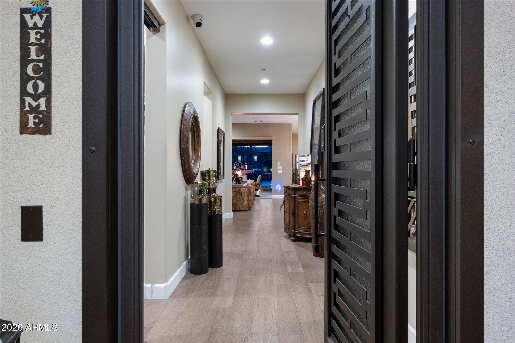17561 Blaze Lane Rio Verde, AZ 85263 - Photo 7 of 46 a view of a hallway with living room and furniture