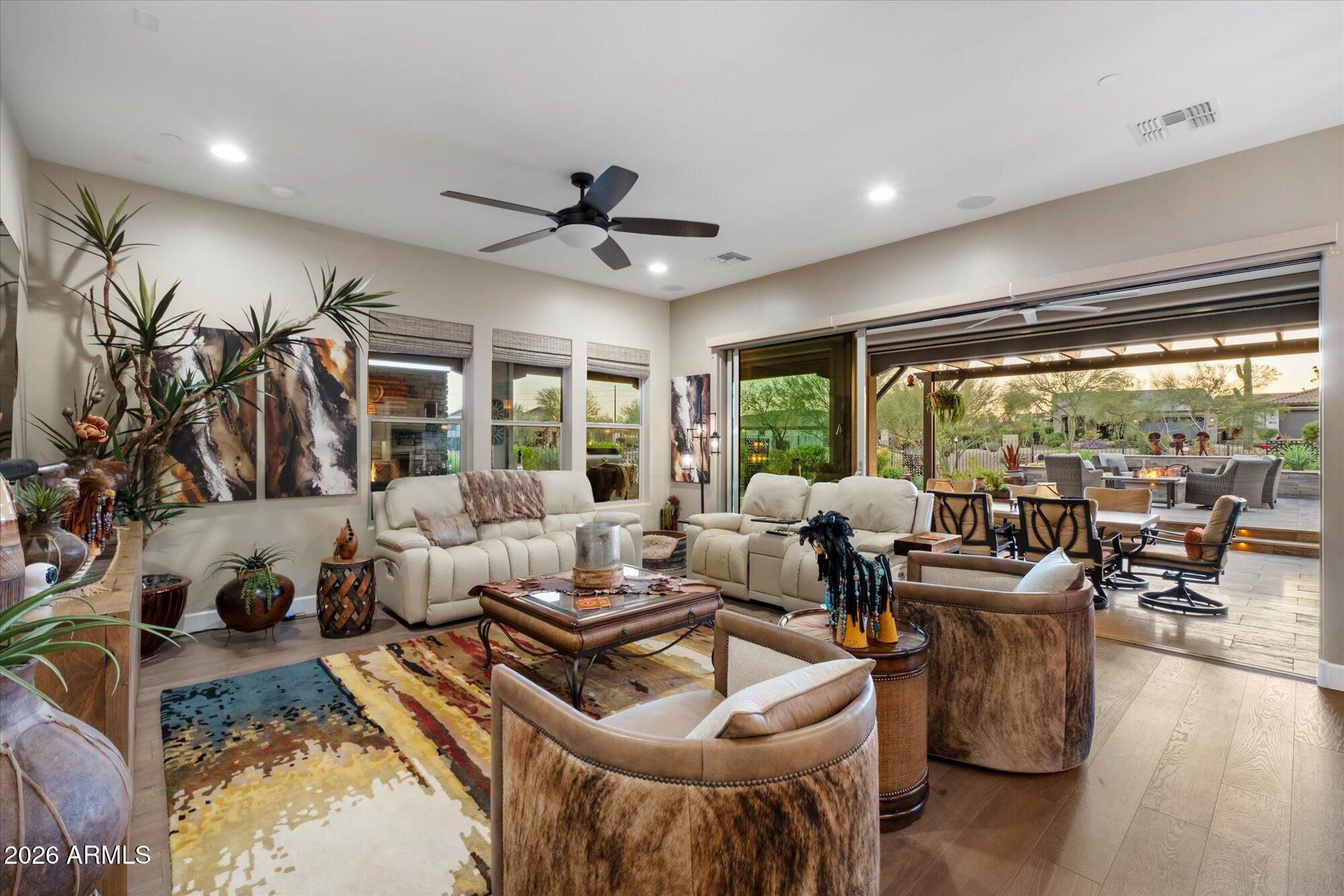 17561 Blaze Lane Rio Verde, AZ 85263 - Photo 9 of 46 a living room with furniture and a large window