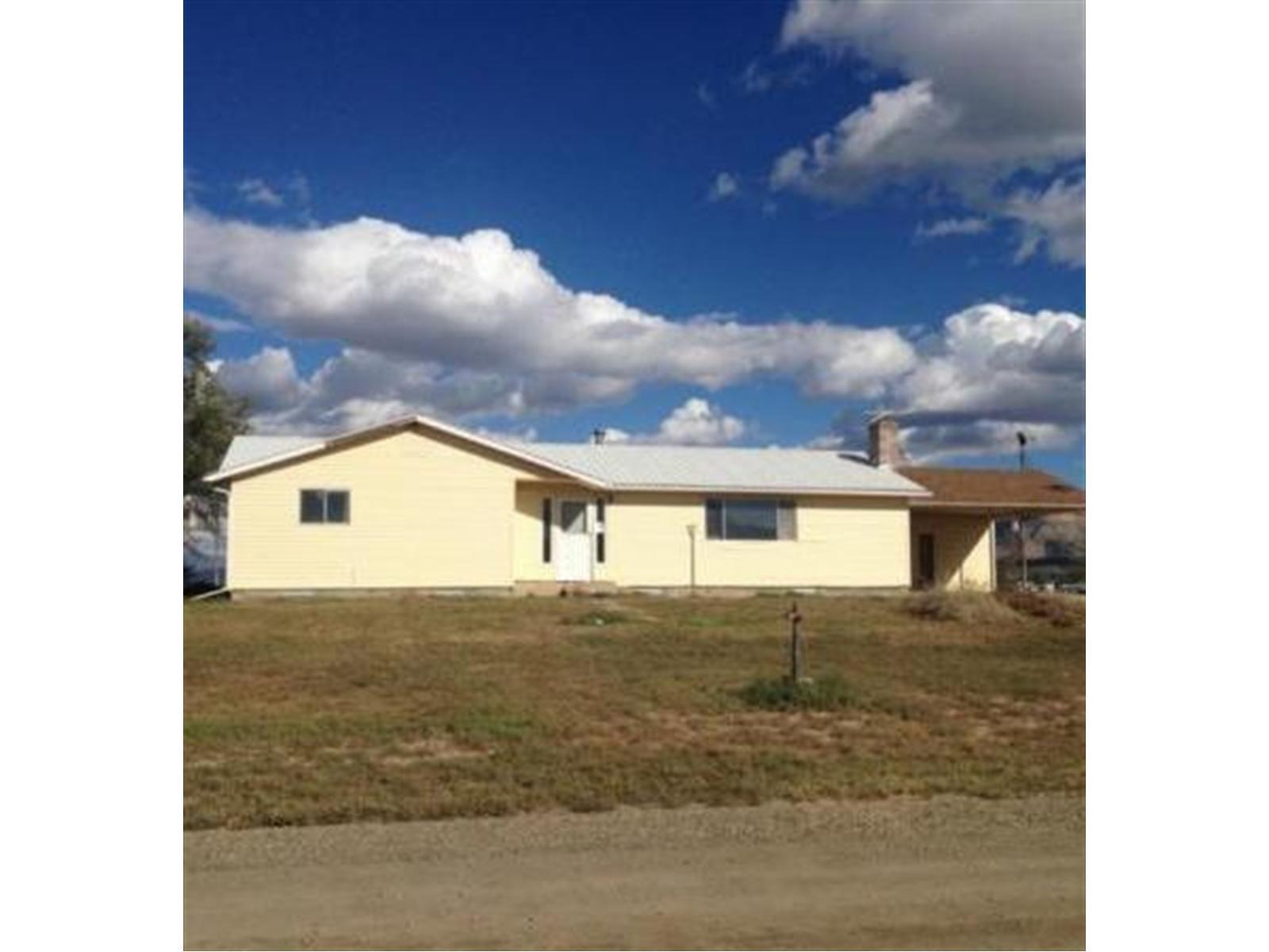 7352 County Road Cortez, CO 81321 - Photo 1 of 1 a view of a house with a yard
