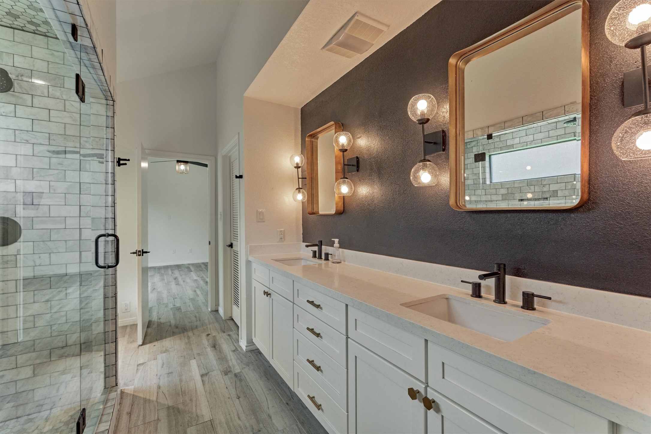 14696 South Diamondhead Conroe, TX 77356 - Photo 22 of 50 Primary bathroom with huge walk in shower. Notice the updated lighting and mirrors.