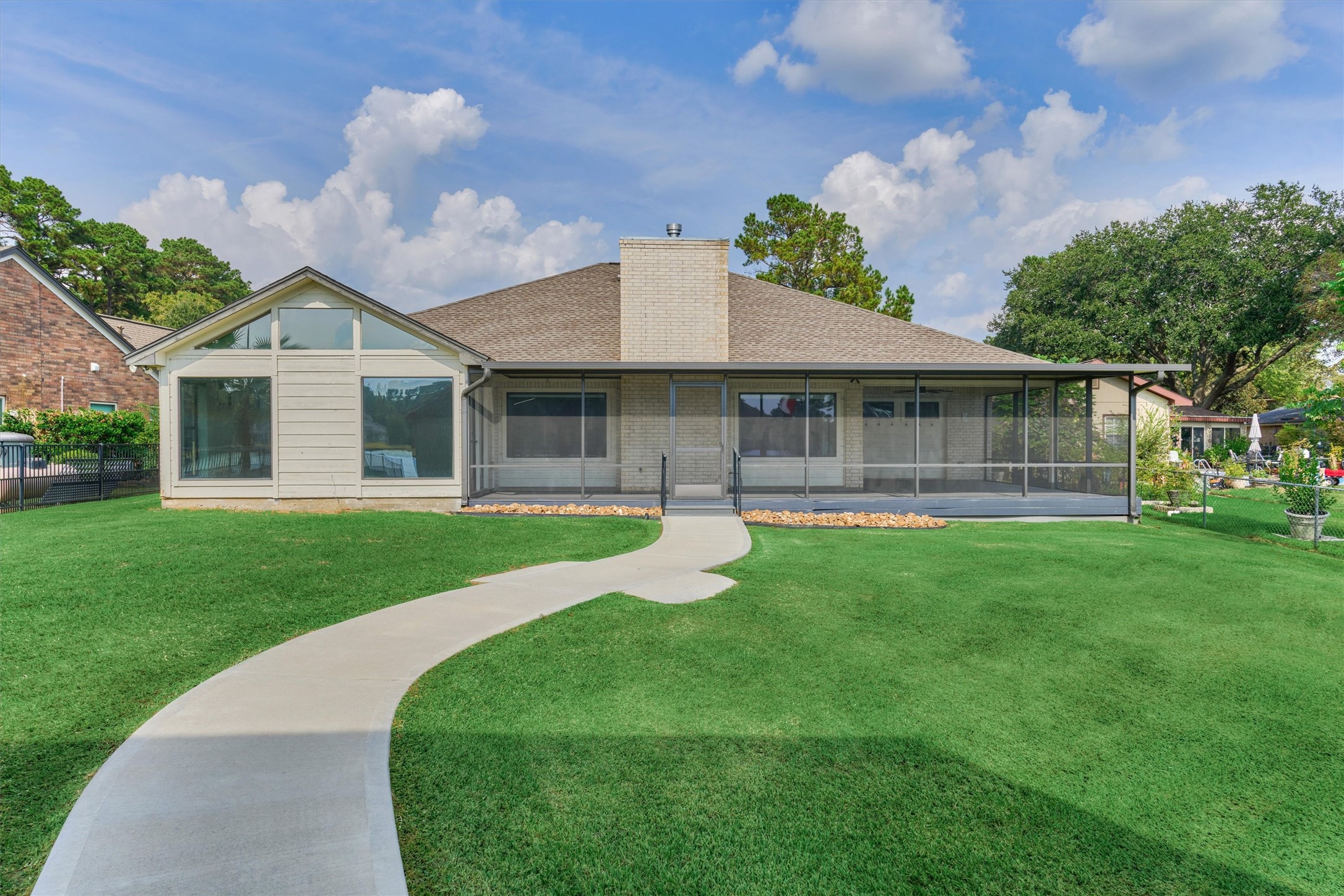 14696 South Diamondhead Conroe, TX 77356 - Photo 38 of 50 Beautiful back yard and concrete walkway.