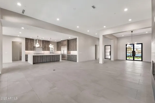 a big room with closet and windows