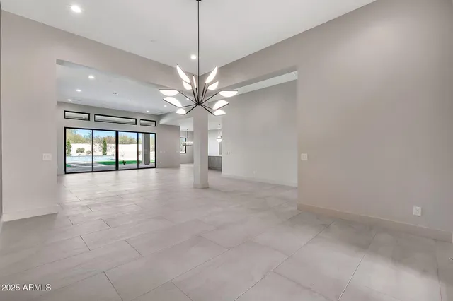 a bathroom with a sink mirror vanity and toilet