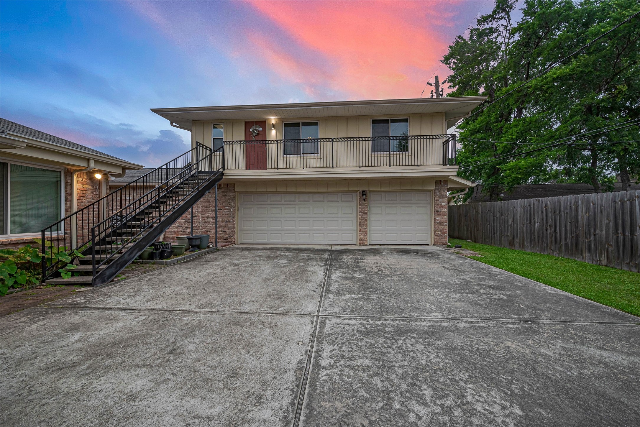 8019 Colgate Street Houston, TX 77061 - Photo 16 of 27 a house with trees in front of it