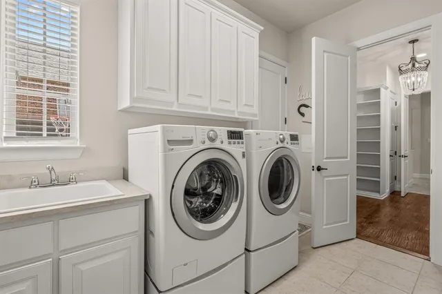 a utility room with dryer and washer