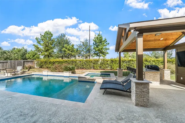 a view of a terrace with sitting area