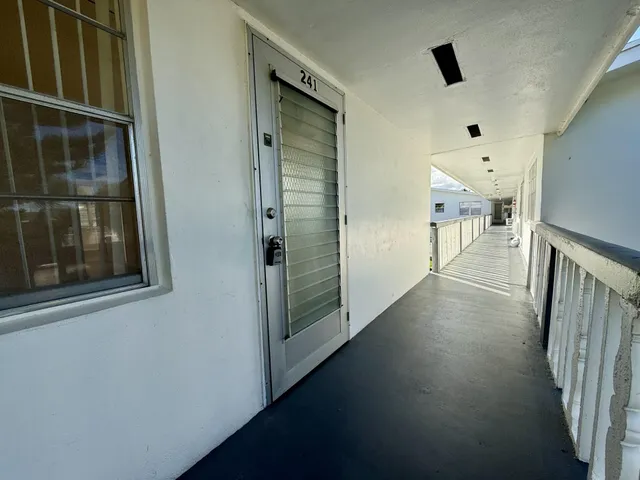 a view of a hallway with window