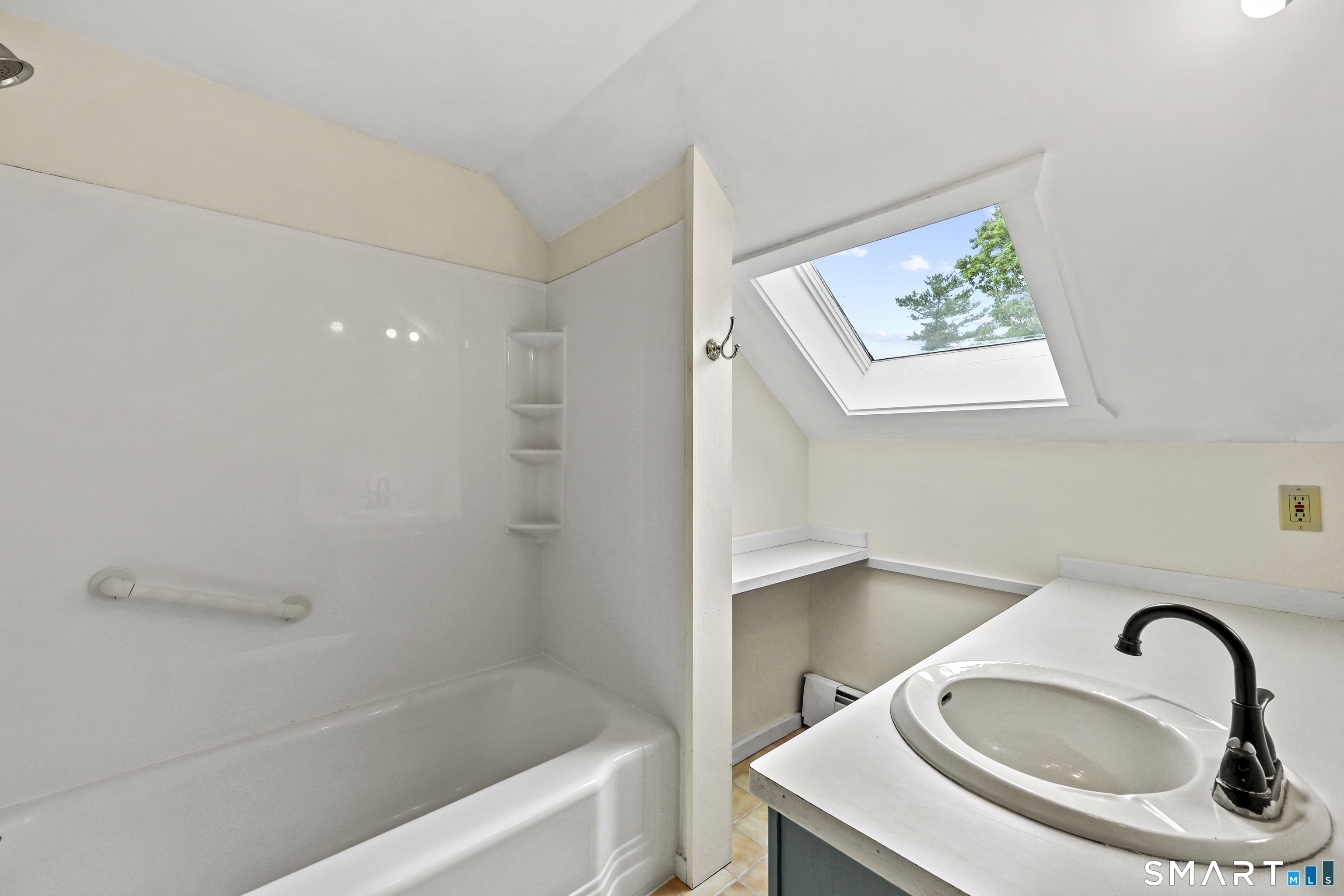 917 Hopewell Road Glastonbury, CT 06033 - Photo 22 of 39 a bathroom with a sink and a bathtub