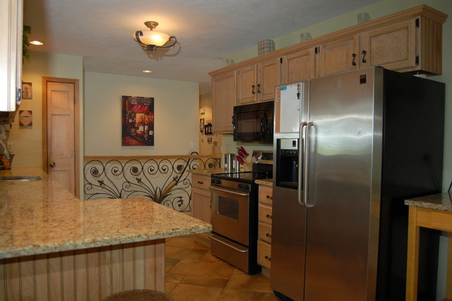 3817 Cutty Sark Road Cherry Valley, IL 61016 - Photo 5 of 15 a kitchen with a refrigerator and a sink