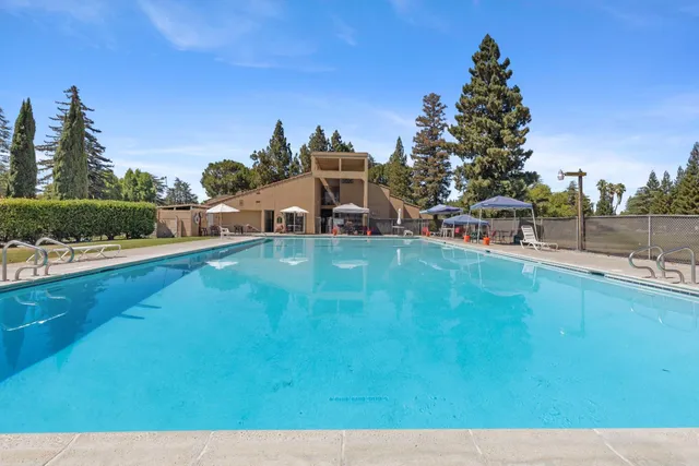 a view of a garden with houses