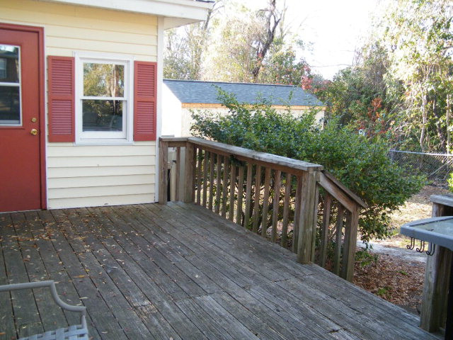 123 Jasper Street Southwest Aiken, SC 29801 - Photo 11 of 15 a balcony with wooden floor in front of house