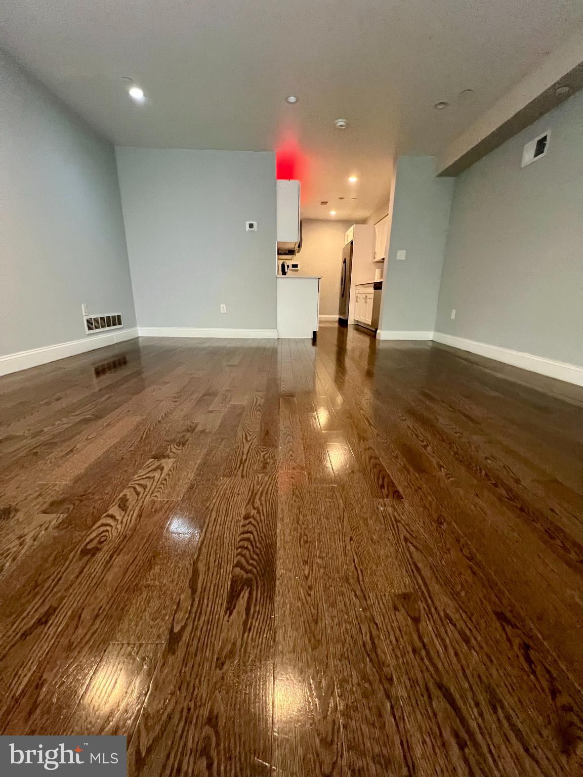 1703 South 22nd Street, Unit 1 Philadelphia, PA 19145 - Photo 6 of 27 a view of a room with wooden floor