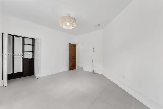 an empty room with closet