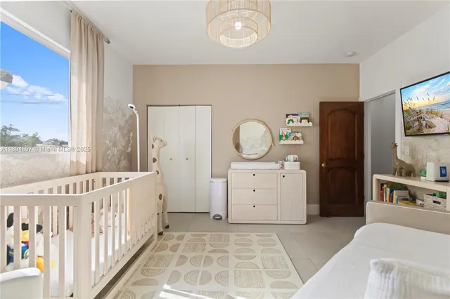 a view of living room and wooden floor