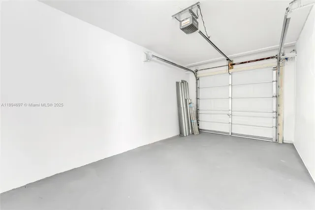 an aerial view of a house with a mountain view