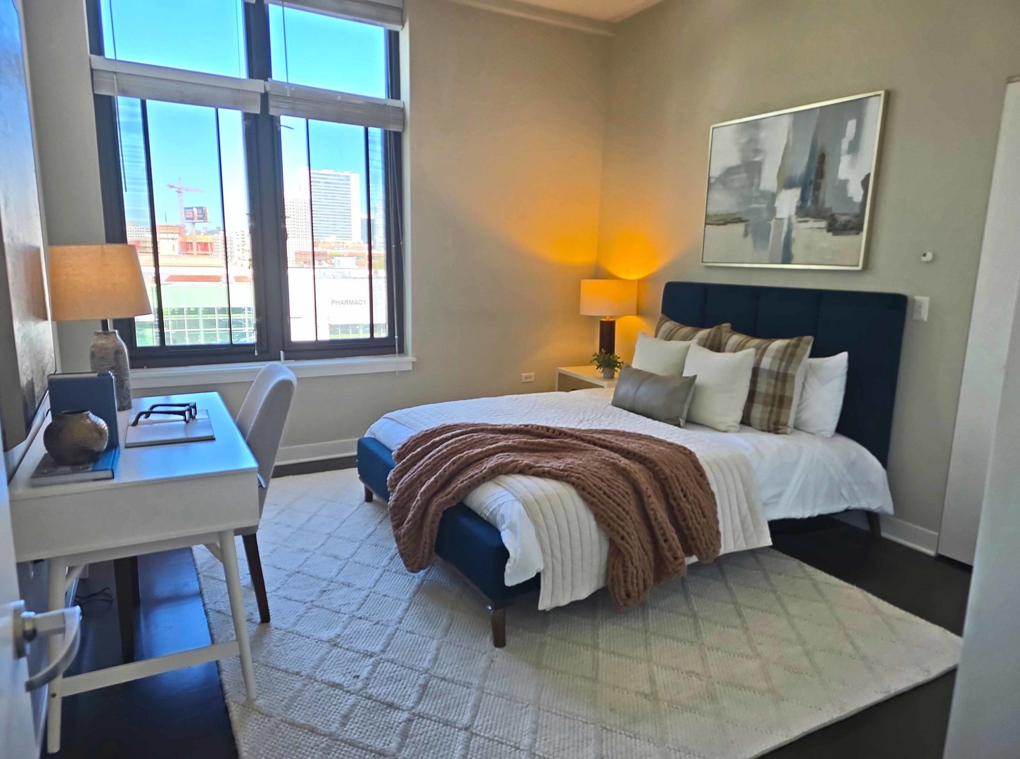 660 West Wayman Street, Unit 701 Chicago, IL 60661 - Photo 7 of 23 a bedroom with a bed and window