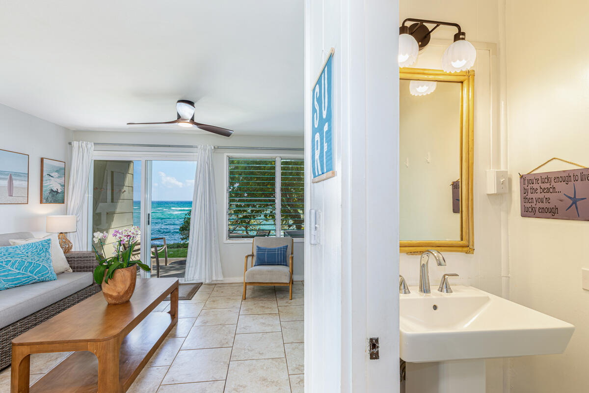 380 Papaloa Road, Unit 2 Kapaa, HI 96746 - Photo 13 of 20 a bathroom with a tub sink and mirror