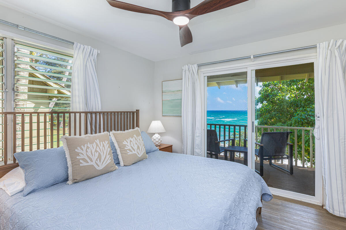 380 Papaloa Road, Unit 2 Kapaa, HI 96746 - Photo 15 of 20 a bed sitting in a bedroom next to a window