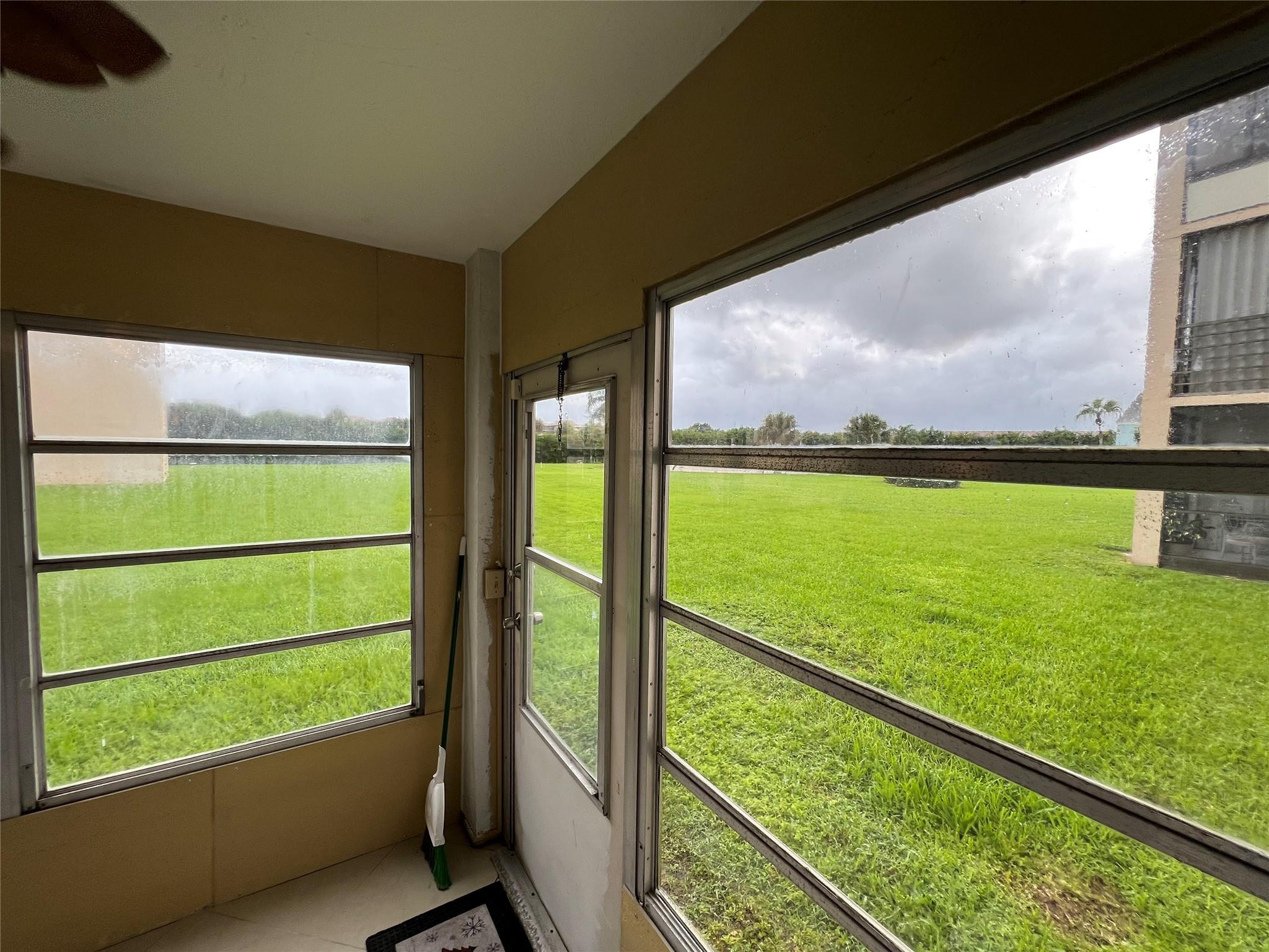 9300 Southwest 8th Street, Unit 108 Boca Raton, FL 33428 - Photo 12 of 40 a view of outdoor space with seating area