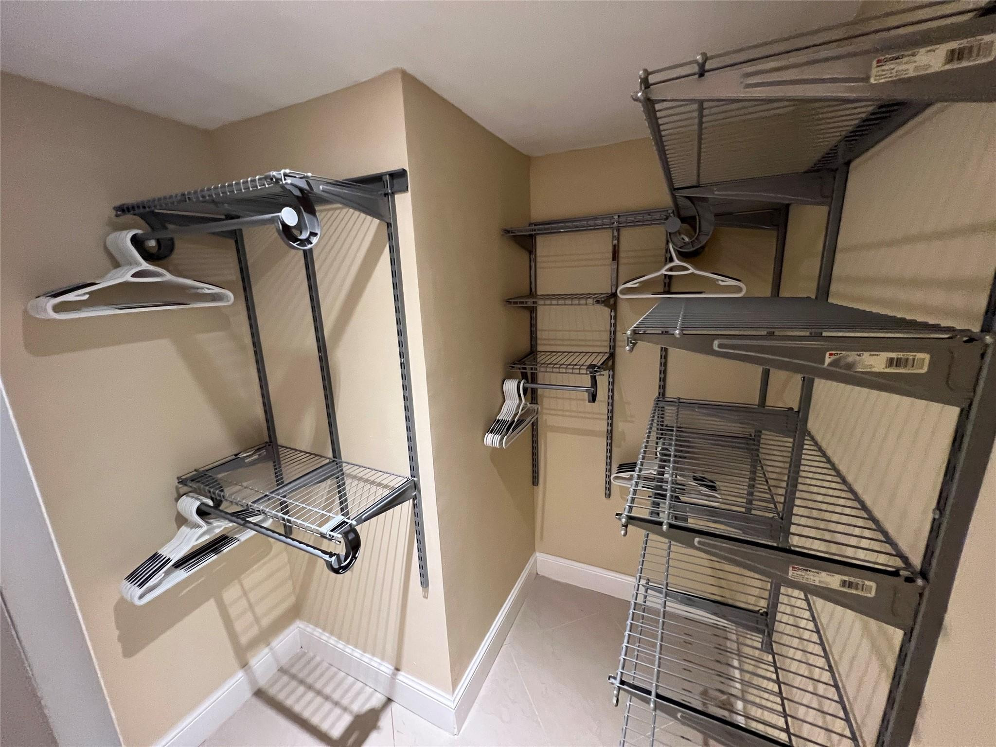 9300 Southwest 8th Street, Unit 108 Boca Raton, FL 33428 - Photo 24 of 40 a view of a room with gym equipment