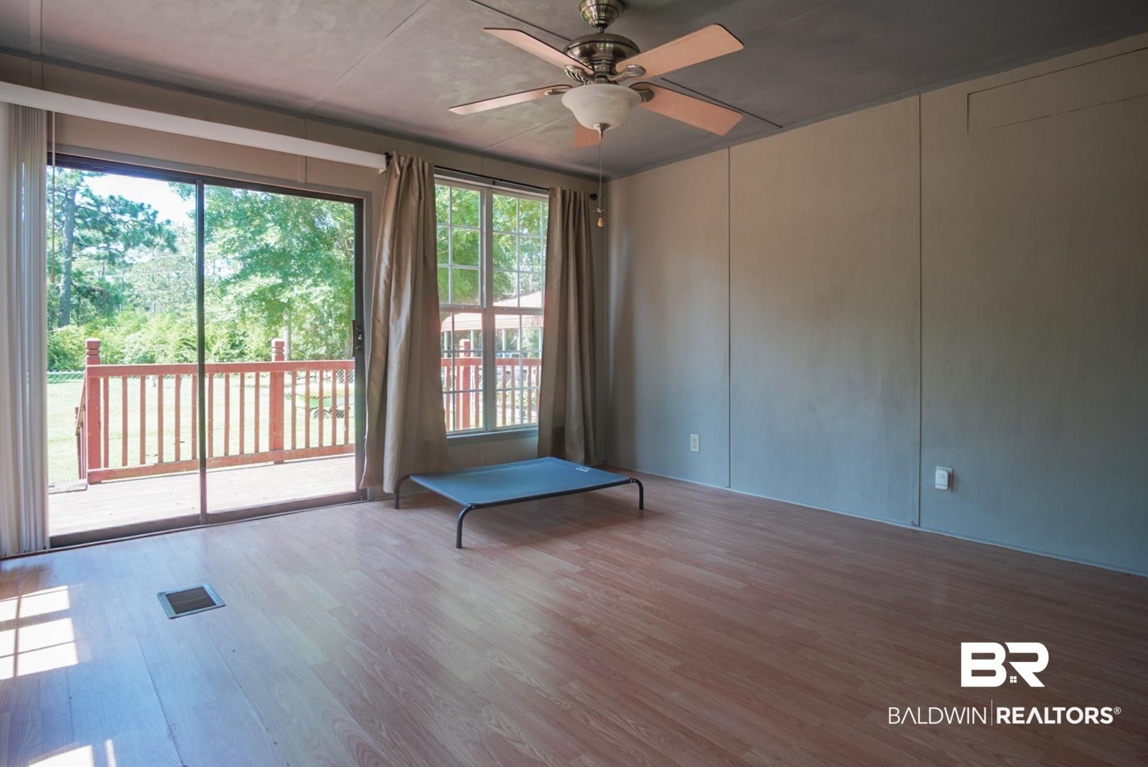 9190 County Road 97 Elberta, AL 36530 - Photo 42 of 53 Empty room with hardwood / wood-style flooring and ceiling fan