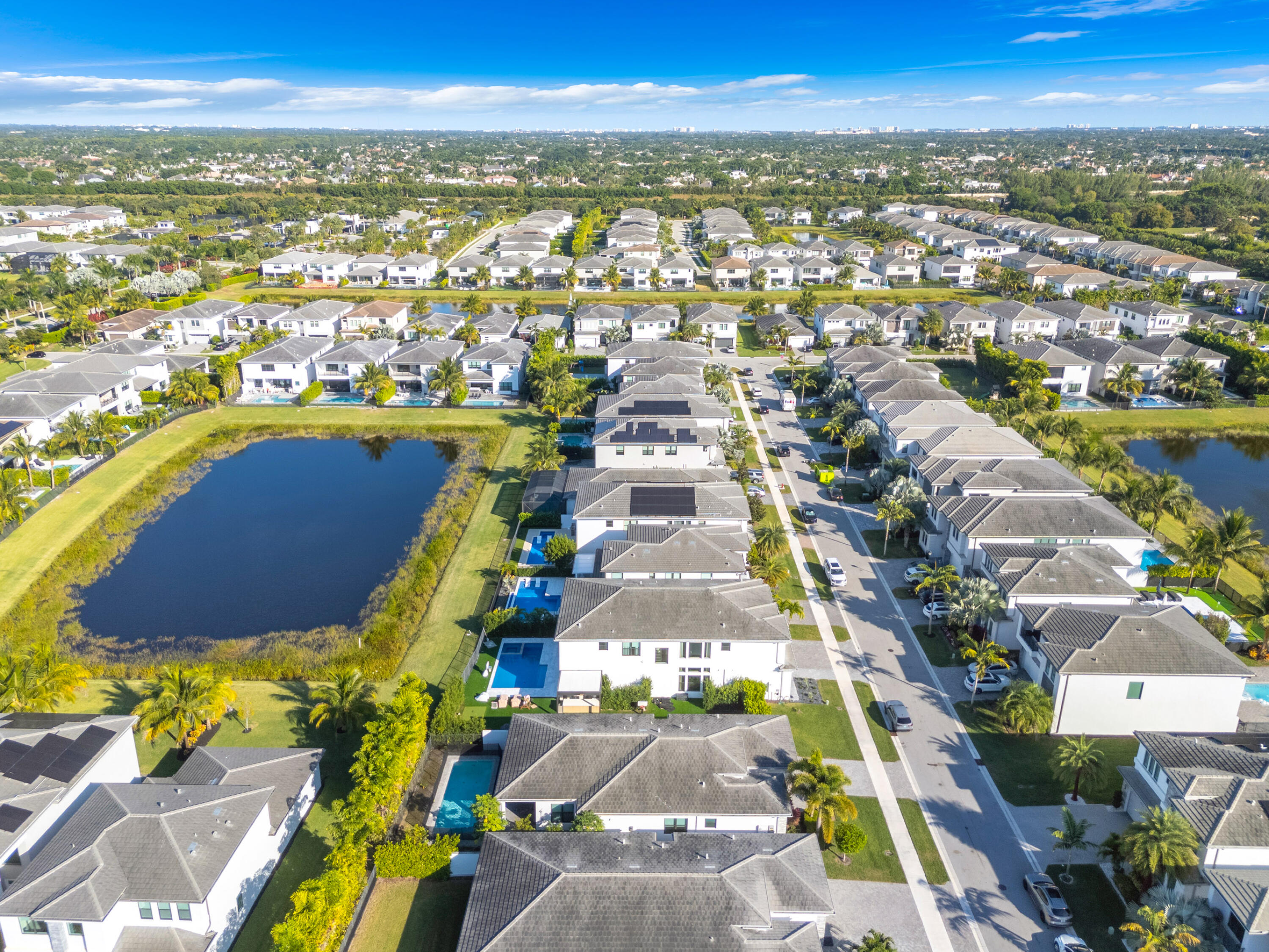 8281 Oceanus Drive Boca Raton, FL 33496 - Photo 11 of 52 an aerial view of residential houses with outdoor space