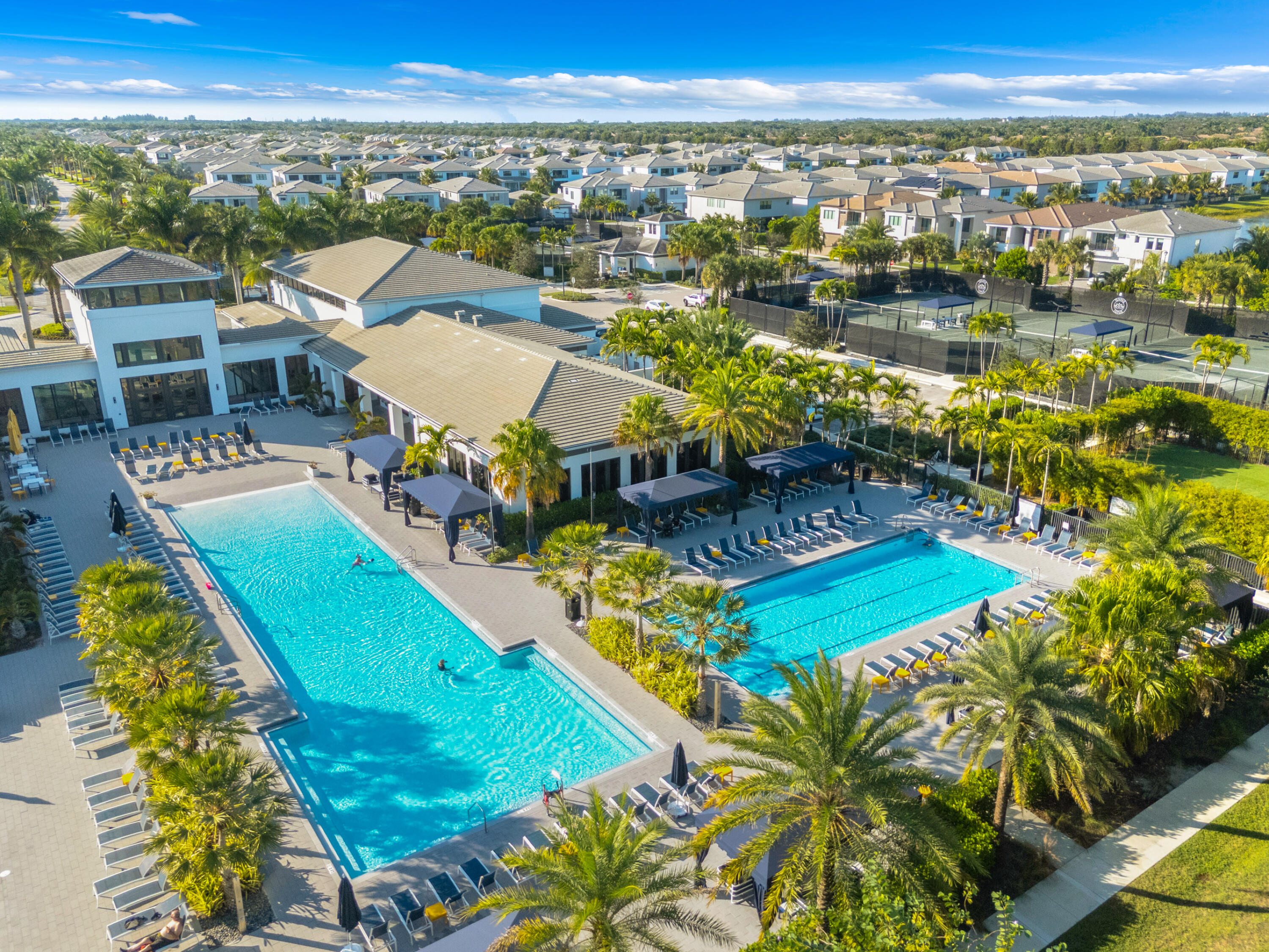 8281 Oceanus Drive Boca Raton, FL 33496 - Photo 2 of 52 an aerial view of a house with a lake view