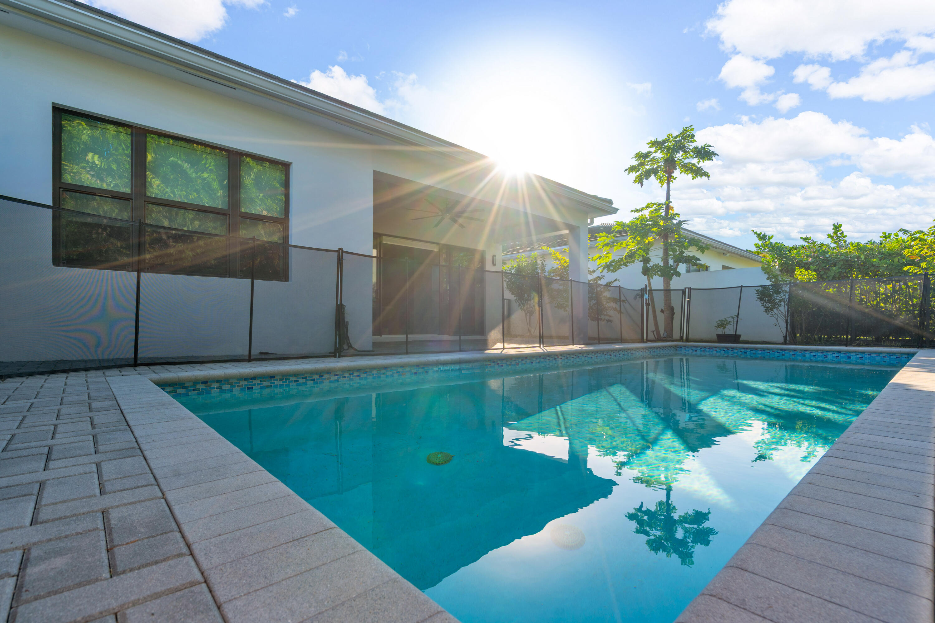 8281 Oceanus Drive Boca Raton, FL 33496 - Photo 21 of 52 a view of a backyard