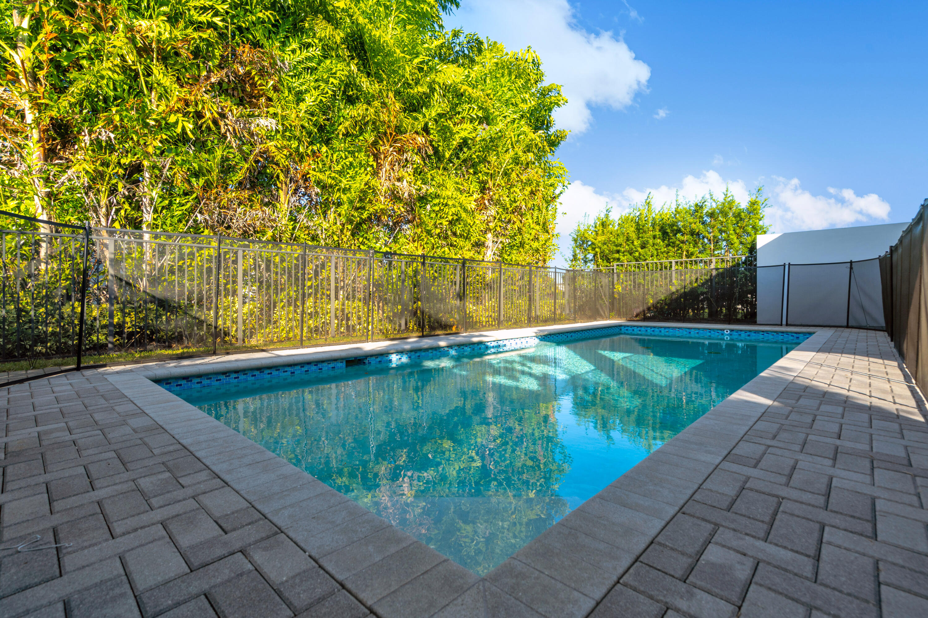 8281 Oceanus Drive Boca Raton, FL 33496 - Photo 22 of 52 a view of a backyard