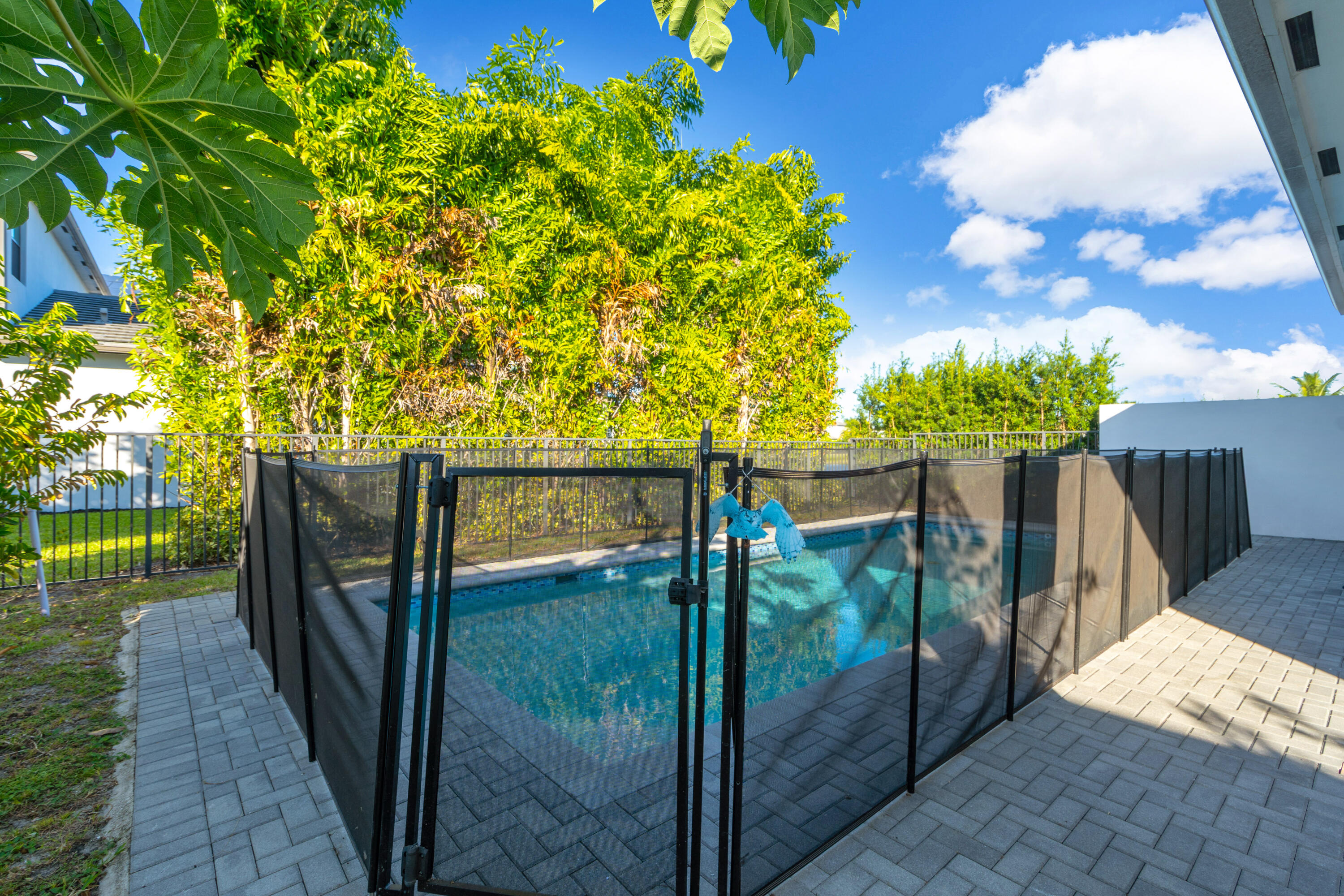 8281 Oceanus Drive Boca Raton, FL 33496 - Photo 23 of 52 a view of swimming pool from a balcony