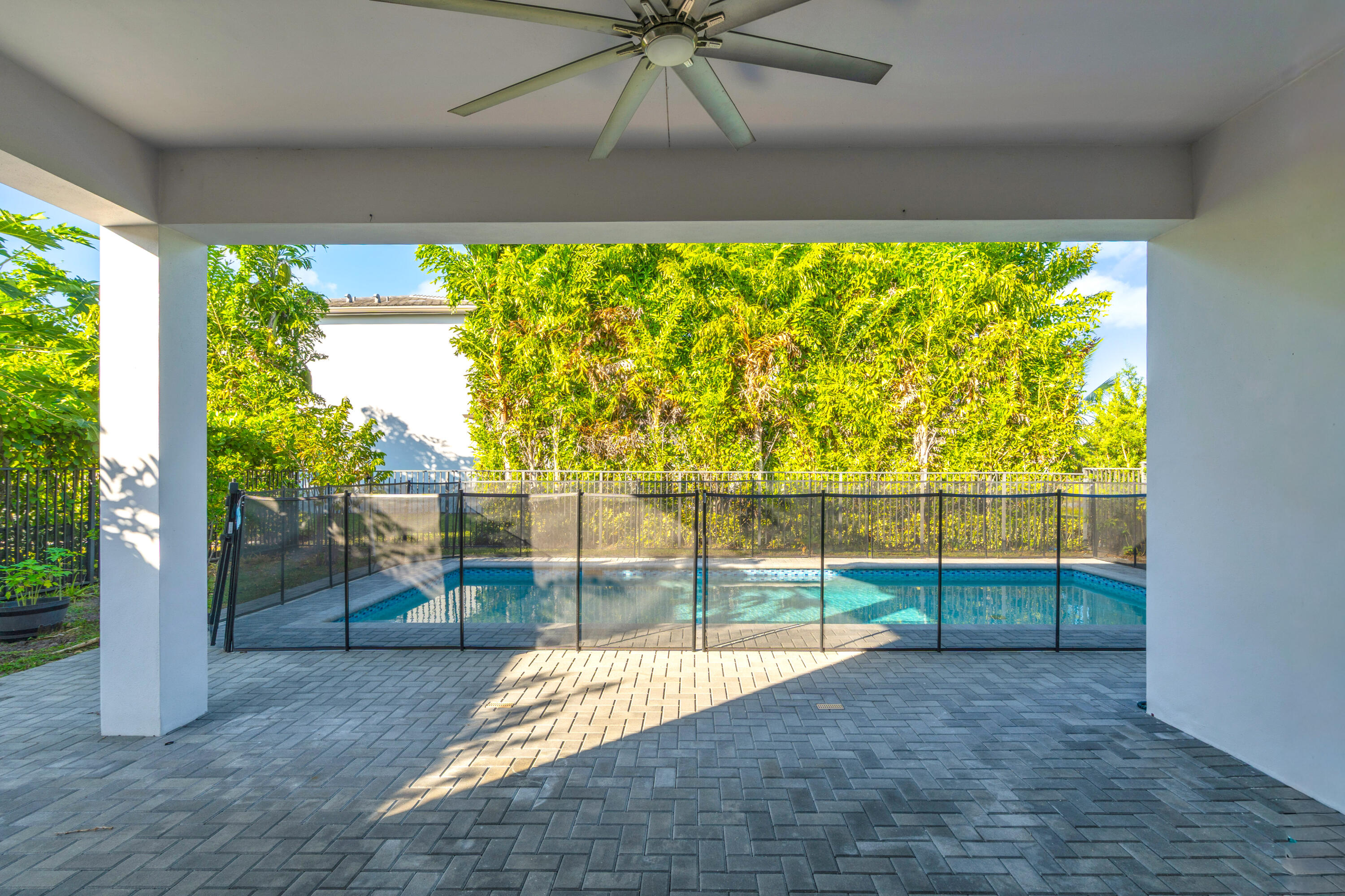 8281 Oceanus Drive Boca Raton, FL 33496 - Photo 24 of 52 a view of empty room with floor to ceiling window