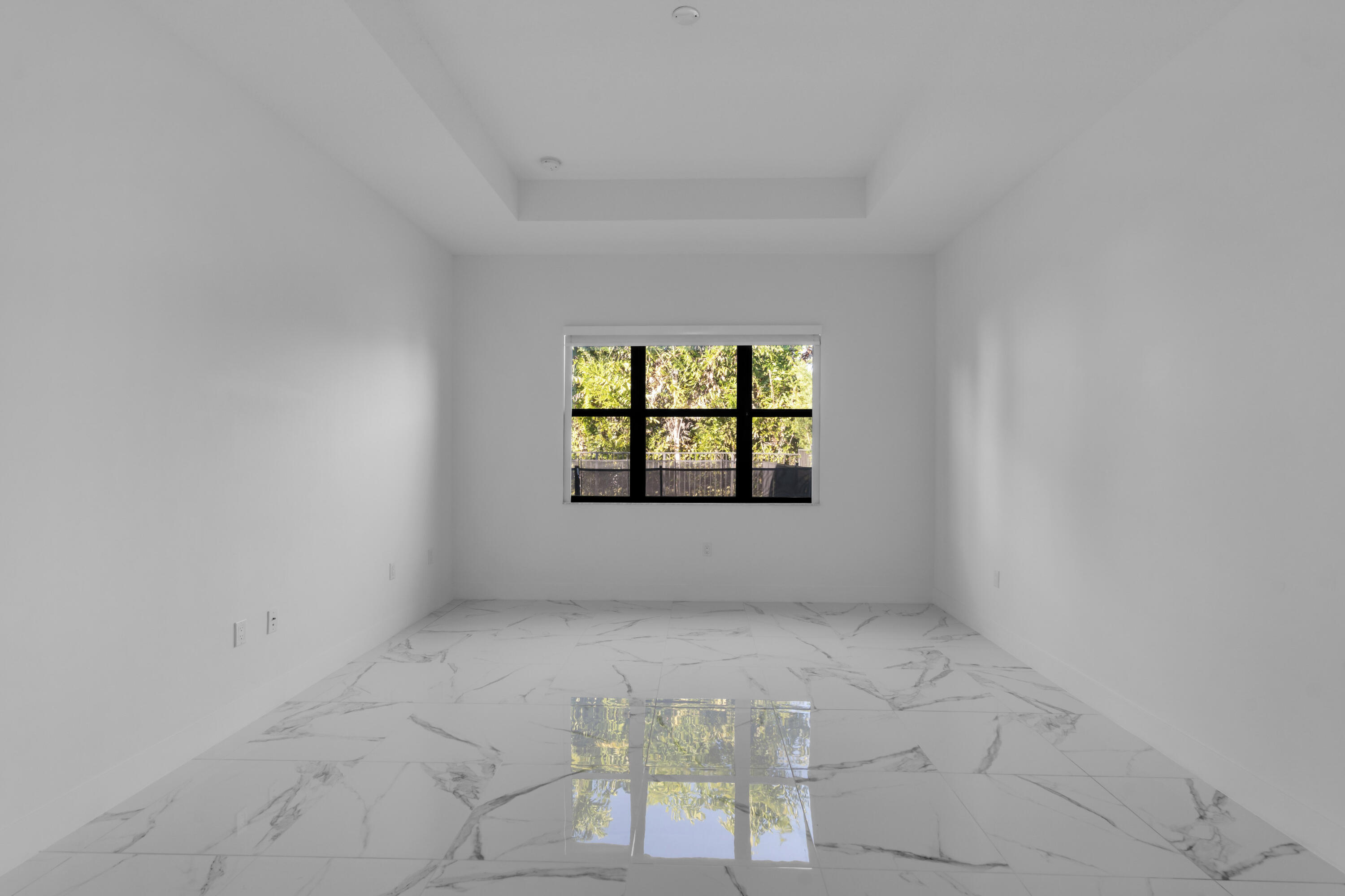 8281 Oceanus Drive Boca Raton, FL 33496 - Photo 35 of 52 an empty room with windows