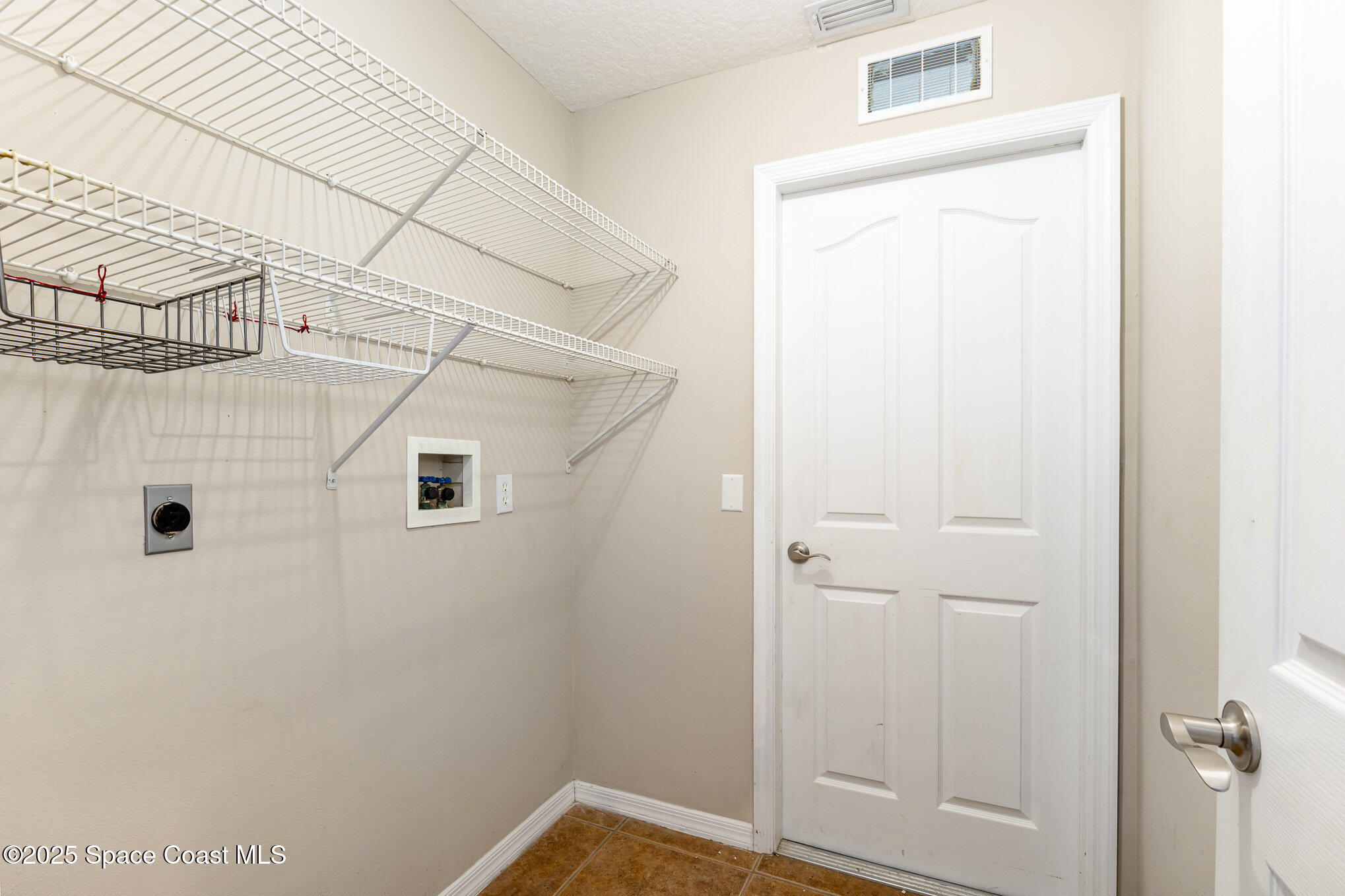 6480 Annapolis Street Cocoa, FL 32927 - Photo 23 of 30 a bathroom with a shower