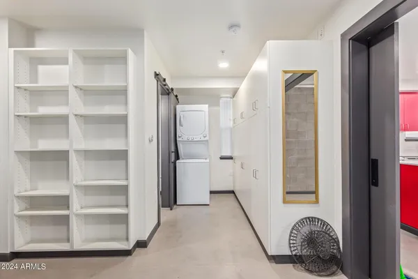 a room with a furniture and a window