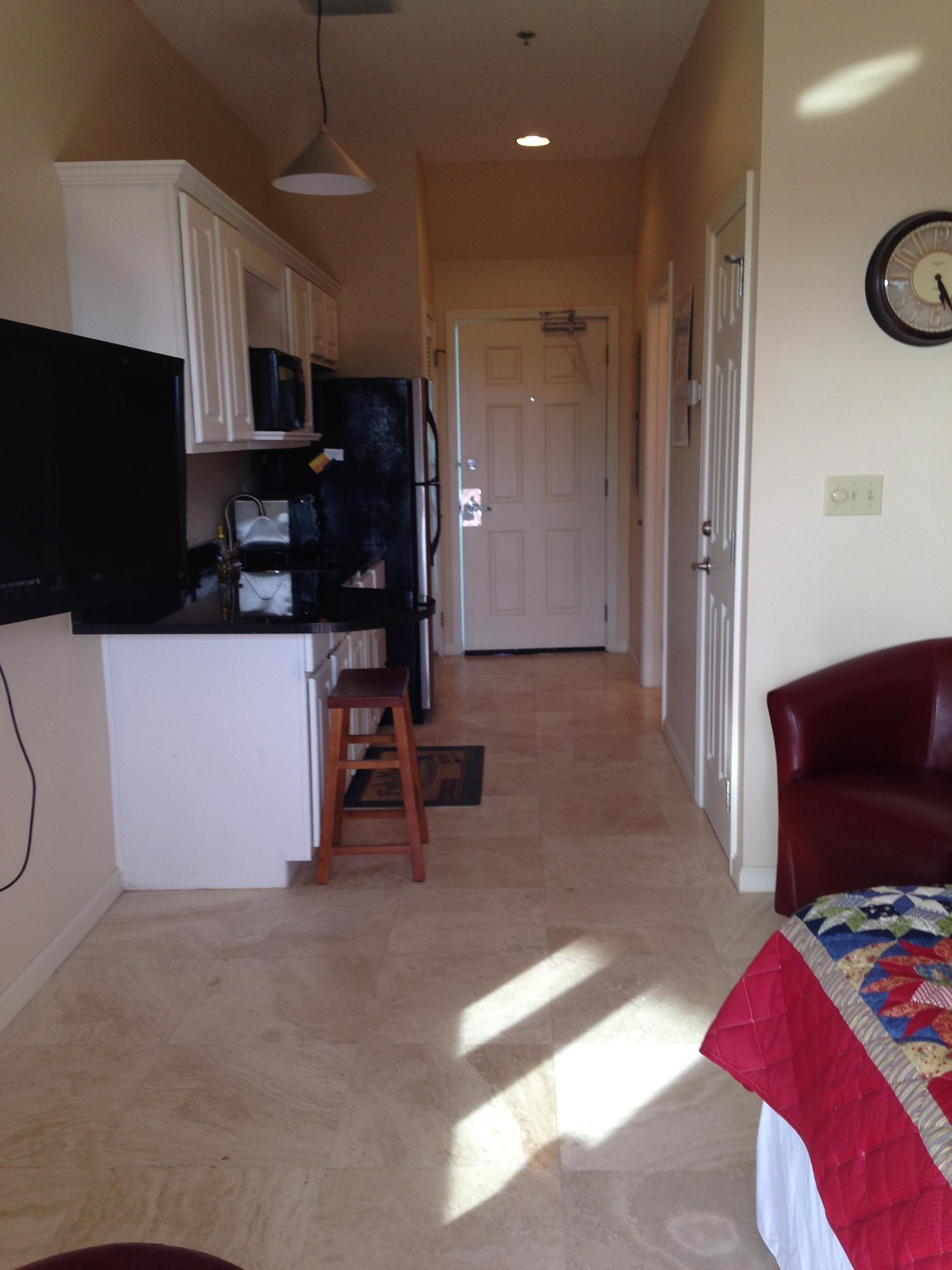 9955 Co Road, Unit 200 Seacrest, FL 32461 - Photo 11 of 17 a living room with furniture and a flat screen tv