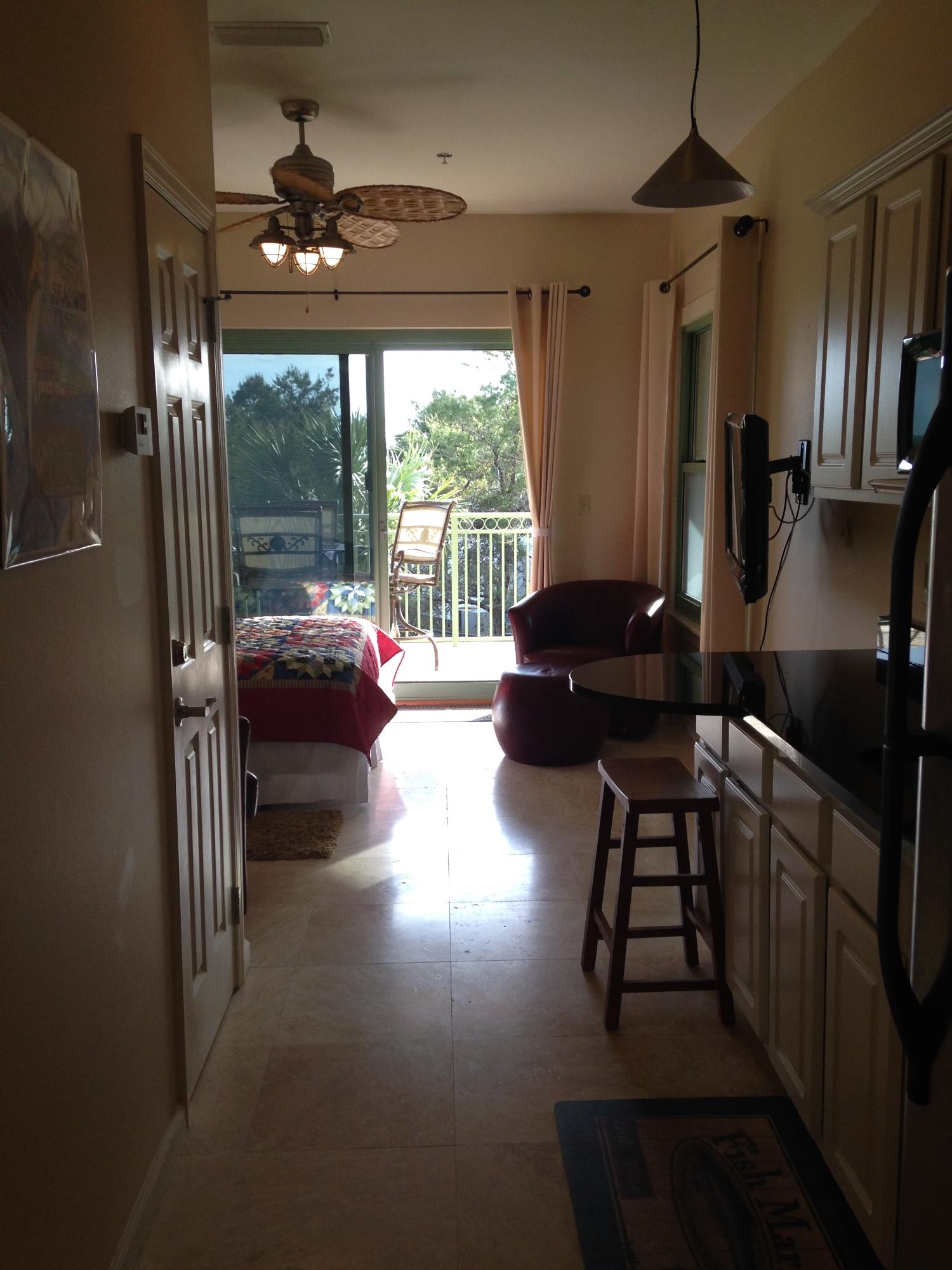 9955 Co Road, Unit 200 Seacrest, FL 32461 - Photo 13 of 17 a living room with furniture and a large window