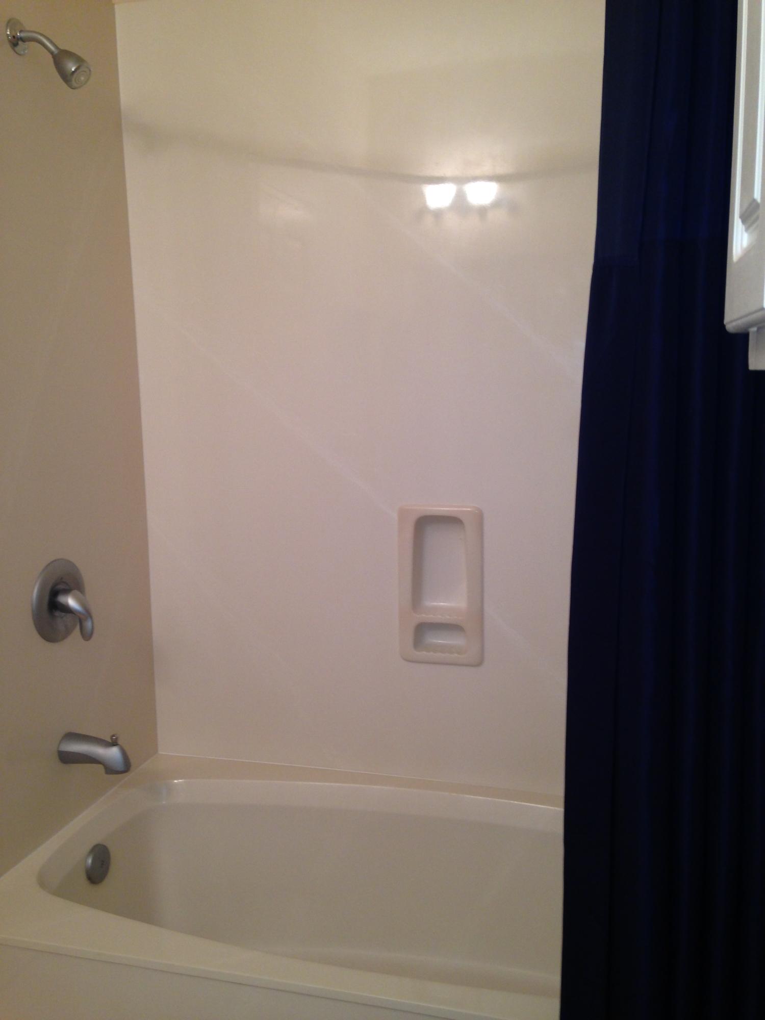 9955 Co Road, Unit 200 Seacrest, FL 32461 - Photo 17 of 17 a bathroom with a bathtub