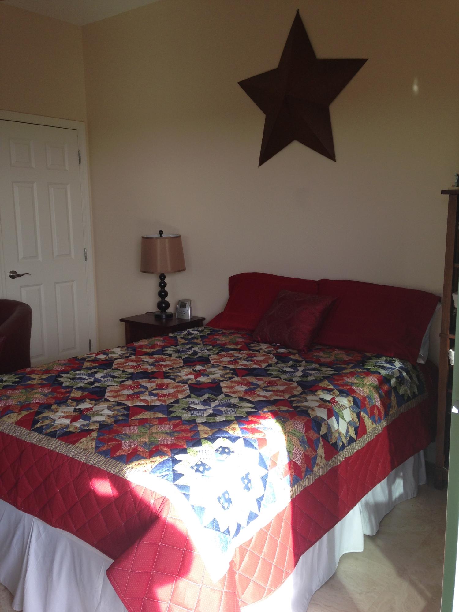 9955 Co Road, Unit 200 Seacrest, FL 32461 - Photo 7 of 17 a bedroom with a bed and a lamp