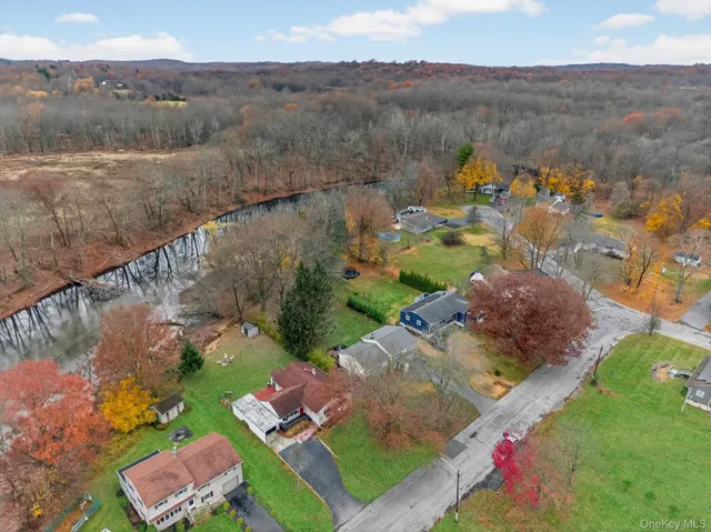 an aerial view of a house with a garden