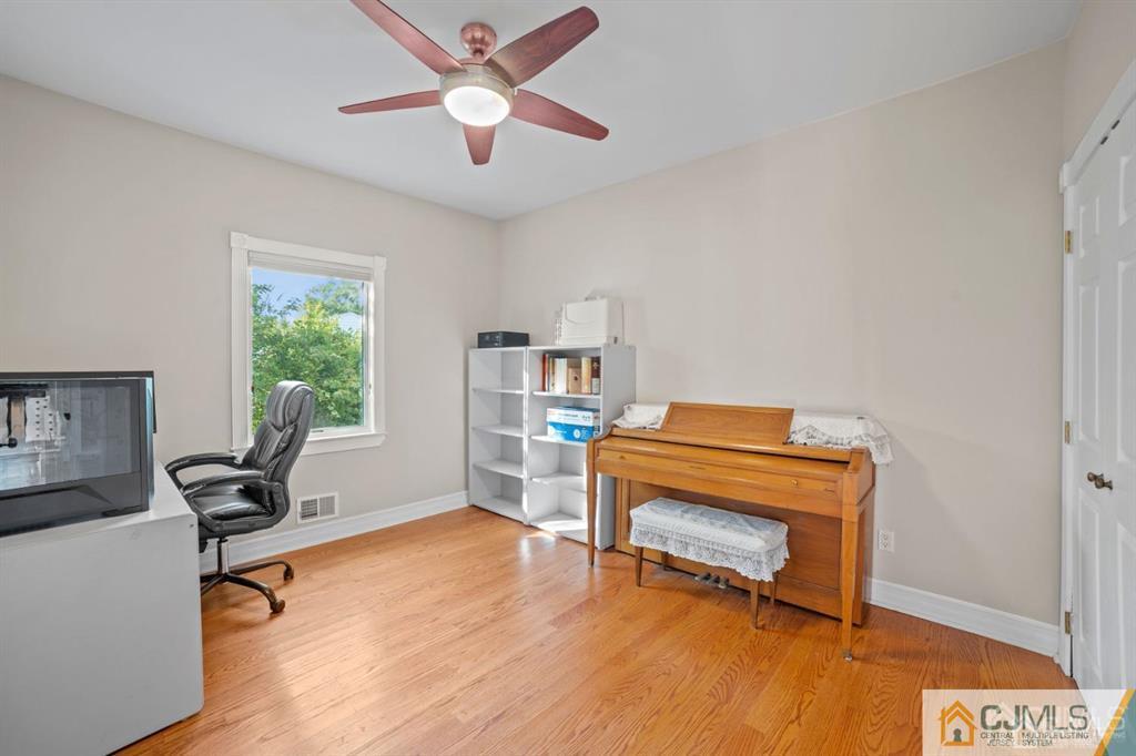 191 West Northfield Road Livingston, NJ 07039 - Photo 10 of 22 a living room with furniture and a window